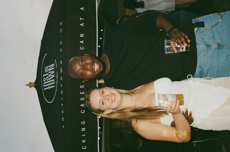 Couple enjoying Lost in Town beer at Taste of London